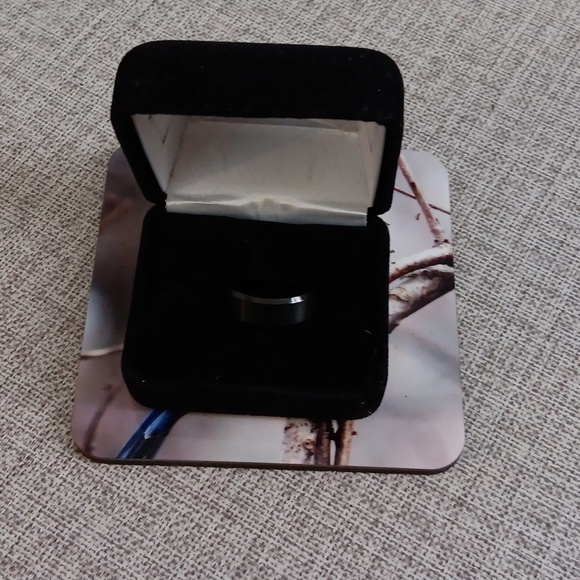 A man's black wedding band